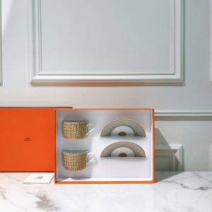 HERMES MOSAIQUE AU 24 TEA CUP AND SAUCER, GOLD64321835929603110